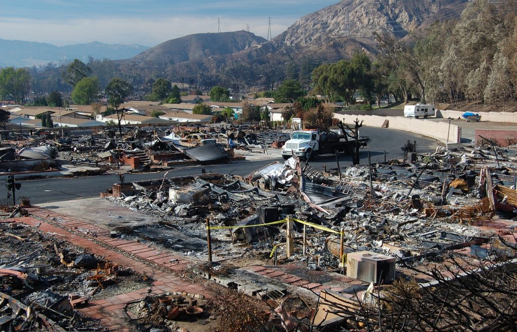 An image capturing a burnt-out home interior, revealing the devastating aftermath of fire damage restoration
